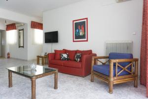 Televízia a/alebo spoločenská miestnosť v ubytovaní Sunny Apartment