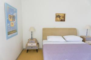 Posteľ alebo postele v izbe v ubytovaní Sunny Apartment