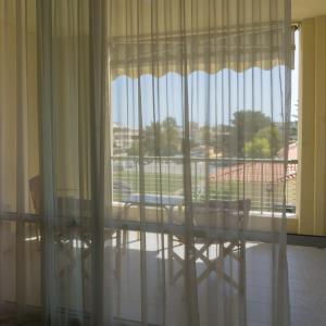 A balcony or terrace at Sunny Apartment