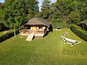 an aerial view of a backyard with a tent at Groot Middenhof in Kamperland