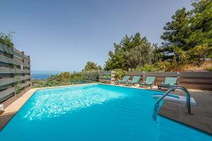 The swimming pool at or close to Mikra Anogia Villas