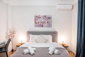 Postel nebo postele na pokoji v ubytování Porto Sea View Apartments - Kypriou
