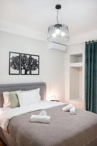 Postel nebo postele na pokoji v ubytování Porto Sea View Apartments - Kypriou