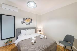 Postel nebo postele na pokoji v ubytování Porto Sea View Apartments - Kypriou