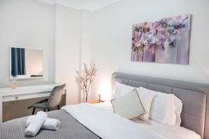Postel nebo postele na pokoji v ubytování Porto Sea View Apartments - Kypriou