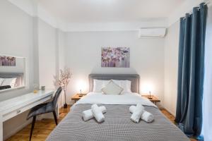 Postel nebo postele na pokoji v ubytování Porto Sea View Apartments - Kypriou