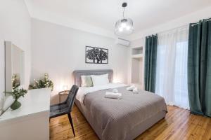 Postel nebo postele na pokoji v ubytování Porto Sea View Apartments - Kypriou