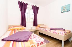 Cama o camas de una habitación en Apartment Nuncijata