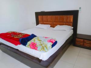 Postel nebo postele na pokoji v ubytování Homestay Ac Dormitory
