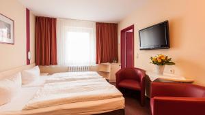 TV a/nebo společenská místnost v ubytování Panorama Hotel Bansin