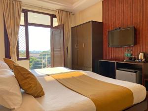 Fotografie z fotogalerie ubytování Hotel Nirvana Palace Rishikesh v destinaci Rišikéš