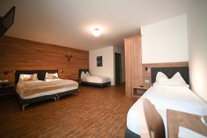 Postel nebo postele na pokoji v ubytování Albergo Sporting