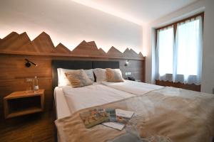 Postel nebo postele na pokoji v ubytování Albergo Sporting