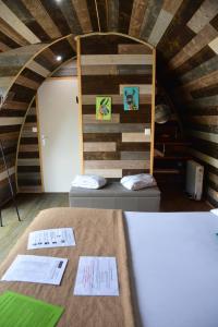 a room with a table with papers on it at Lodges des grands crus in Chablis