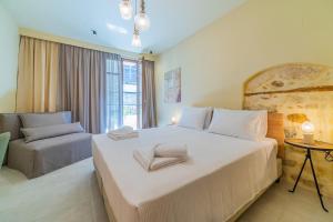Ένα ή περισσότερα κρεβάτια σε δωμάτιο στο Anatoli Residence