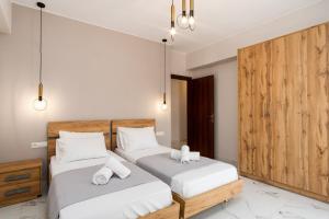 Posteľ alebo postele v izbe v ubytovaní Villa Karouzo - With Private Pool