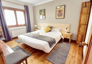 Posteľ alebo postele v izbe v ubytovaní Hostal Fonda Prat