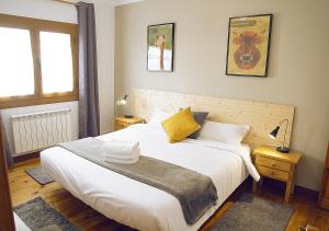 Posteľ alebo postele v izbe v ubytovaní Hostal Fonda Prat