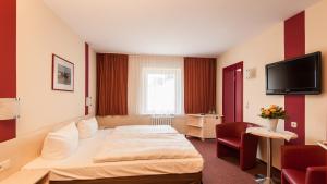 TV a/nebo společenská místnost v ubytování Panorama Hotel Bansin