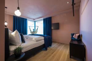Posteľ alebo postele v izbe v ubytovaní Sport Hotel Passo Carezza