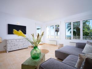 A seating area at Holiday Home La Begonia by Interhome