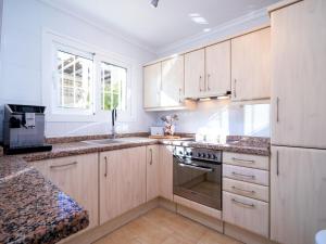 A kitchen or kitchenette at Holiday Home La Begonia by Interhome