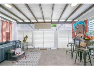 Posezení v ubytování Appartement Maëva, Idéal Couple, Jacuzzi