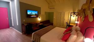 Cama ou camas em um quarto em Pousada Toca da Praia