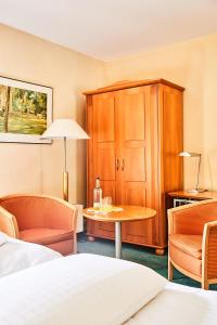 Postel nebo postele na pokoji v ubytování Hotel Landhaus an de Dün
