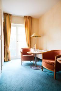 Posezení v ubytování Hotel Landhaus an de Dün