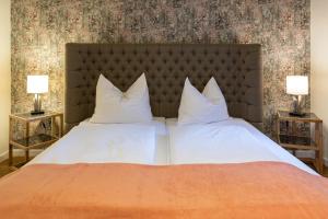 Postel nebo postele na pokoji v ubytování Altstadthotel Zur Börse