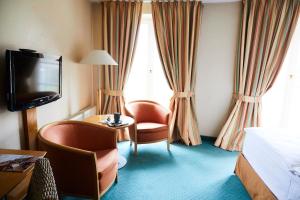Posezení v ubytování Hotel Landhaus an de Dün