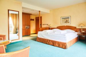Postel nebo postele na pokoji v ubytování Hotel Landhaus an de Dün