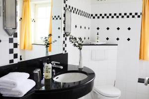 Koupelna v ubytování Hotel Landhaus an de Dün