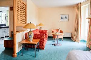 Posezení v ubytování Hotel Landhaus an de Dün