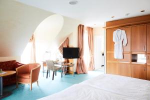 Postel nebo postele na pokoji v ubytování Hotel Landhaus an de Dün