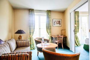 Posezení v ubytování Hotel Landhaus an de Dün