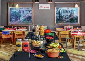 a table with food on it in a restaurant at Ginger Bangalore- Whitefield in Bangalore