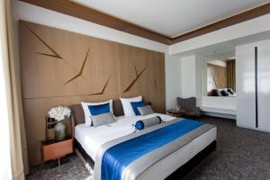 Letto o letti in una camera di Hotel Austria & Bosna