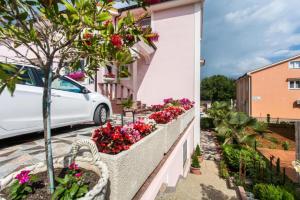 Vonkajšia záhrada v ubytovaní Apartman 1 Paola