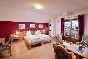 Posteľ alebo postele v izbe v ubytovaní APARTMENT SONNBLICK Kaprun Salzburg - incl Zell am See-Kaprun Summercard