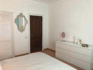 Postel nebo postele na pokoji v ubytování Unìco a Roma
