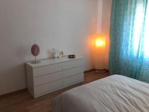 Postel nebo postele na pokoji v ubytování Unìco a Roma
