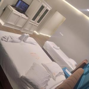 Hotel Konti客房内的一张或多张床位