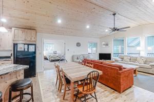 a living room with a couch and a table at Glacier Lake in Joseph