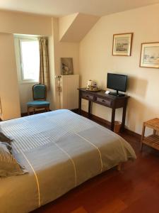 Кровать или кровати в номере Le clos Saint Aubin