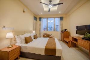 Postel nebo postele na pokoji v ubytování Amber Beach Hotel + 37 fotografií