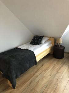 Posteľ alebo postele v izbe v ubytovaní DW Basia pokoje i apartament