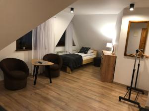 Posteľ alebo postele v izbe v ubytovaní DW Basia pokoje i apartament