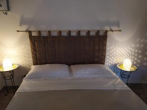 Säng eller sängar i ett rum på Trullo Libellula
